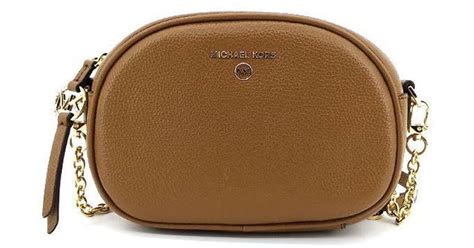 michael kors sm oval camera xbody|Michael Kors leather crossbody bag.